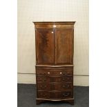 A George II style walnut tall boy, of serpentine form, with brushing slide, 72cm wide