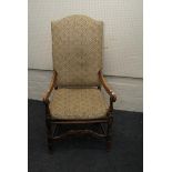 A Carolean style cane seated open armchair, with scroll arms