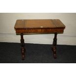 A Victorian carved mahogany lady's writing desk with ratcheted inclining top, 92cm wide