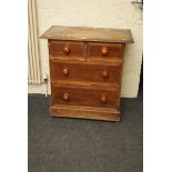 An early 20th century pine narrow chest of drawers with knob handle and plinth base, 78cm wide