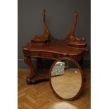A Victorian mahogany cartouche topped Duchess dressing table, 121cm