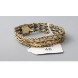 A fancy link bracelet, the chevron and ropetwist band with concealed push button clasp, marked '