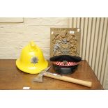 A collection of items relating to the city of Oxford fire service including a cast iron