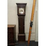 An 18th century oak cased 8-day longcase clock, the brass dial with calendar and secondary dials,