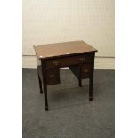 A George III style mahogany kneehole side table with square supports, 72cm wide