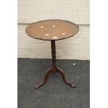 A George III style mahogany pie crust topped wine table, with tripod base, 53cm diameter