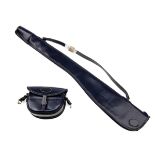 A FINE UNUSED BLUE LEATHER FLEECE-LINED SINGLE GUN SLIP WITH MATCHING CARTRIDGE BAG, slip with