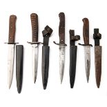 FOUR GERMAN WORLD WAR ONE AND TWO BOOT or TRENCH-KNIVES, ONE SIGNED 'HUGO KOLLER, SOLINGEN', all