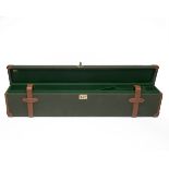 A CANVAS AND LEATHER LIGHTWEIGHT SINGLE UNIVERSAL GUNCASE, fitted for 28in. barrels, the interior