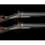 MADE FOR THE PARIS EXHIBITION J. PURDEY & SONS A FINE PAIR OF 12-BORE TOPLEVER HAMMER EJECTOR