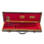 JAMES PURDEY & SONS A BRASS-CORNERED OAK AND LEATHER SINGLE GUNCASE, fitted for 28in. barrels (could