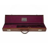 ARMURERIE VOUZELAUD A LIGHTWEIGHT LEATHER SINGLE GUNCASE, fitted for 30in. barrels, the interior