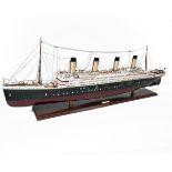 A REPLICA MODEL OF THE UNSINKABLE VESSEL 'THE ROYAL MAIL SHIP TITANIC', a hand made model with