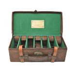 A LEATHER CARTRIDGE MAGAZINE, for approx. 500 cartridges, the interior lined with green baize,