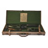 WESTLEY RICHARDS A BRASS-CORNERED LEATHER DOUBLE GUNCASE, fitted for 30in. barrels, the interior