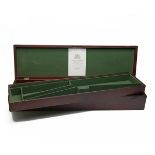 WESTLEY RICHARDS A TWO-TIER BRASS-CORNERED WALNUT DOUBLE PERCUSSION GUNCASE, fitted for 31in.