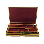 GUARDIAN LEATHER A NEW AND UNUSED BRASS-CORNERED OAK AND LEATHER PRESENTATION DOUBLE GUNCASE, fitted