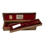 JAMES PURDEY A BRASS-BOUND OAK AND LEATHER TWO-TIER DOUBLE HAMMERGUN CASE, fitted for 30in. barrels,