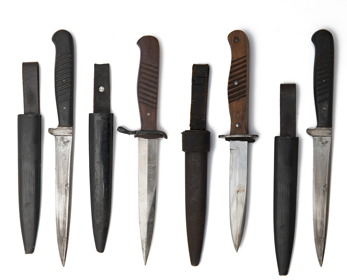 A COLLECTION OF FOUR GERMAN WORLD WAR ONE TRENCH or BOOT KNIVES, one signed 'ERNST BUSCH',