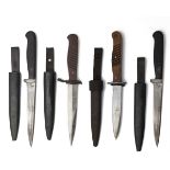 A COLLECTION OF FOUR GERMAN WORLD WAR ONE TRENCH or BOOT KNIVES, one signed 'ERNST BUSCH',