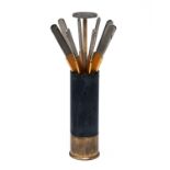 ASPREY AN EIGHT PEG PLACEFINDER IN THE FORM OF A 12-BORE CARTRIDGE, in brass with blued body,