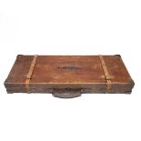 A BRASS-CORNERED OAK AND LEATHER DOUBLE GUNCASE, fitted for 28in. barrels (could adapt to 30in.),