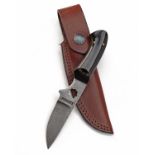 JAMES PURDEY & SONS AN UNUSED SMALL BUFFALO HORN AND BRASS DAMASCUS STEEL HUNTING KNIFE, with an