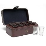 REY PAVON A NEW AND UNUSED BEST QUALITY LEATHER-CASED SET OF EIGHT SHOT GLASSES, shot glasses housed