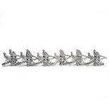 ARI D. NORMAN A SET OF SIX STERLING SILVER PHEASANT AND RIFLE MENU HOLDERS, with 925 London silver