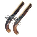 A PAIR OF .650 FLINTLOCK BRASS-BARRELLED OFFICER'S PISTOLS SIGNED 'A.W. SPIES, LONDON', no visible