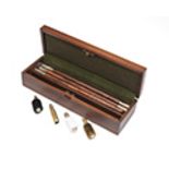 A NEW AND UNUSED CASED 12-BORE GUN-CLEANING KIT, including an oak and brass cleaning rod, brush, mop