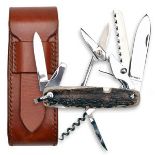 JAMES PURDEY & SONS AN UNUSED STAG HORN MULTI-TOOL POCKET KNIFE, a hand-made nine piece tool with