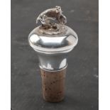 A STERLING SILVER-TOPPED GAME SCENE CORK BOTTLE STOPPER, with 'AJP' 925 silver hall marks, the top