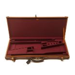 PARSONS LEATHER A LEATHER DOUBLE GUNCASE, fitted for 32in. barrels, the interior lined with maroon