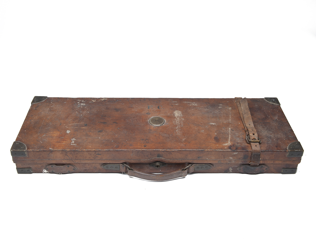 JAMES PURDEY & SONS A BRASS-CORNERED OAK AND LEATHER SINGLE GUNCASE, crudely refitted for 30in. - Image 2 of 2