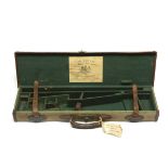 JOHN RIGBY A CANVAS AND LEATHER .275 BREAK-BARREL TAKE-DOWN RIFLE CASE, fitted for 26in. (could