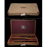 GUARDIAN A NEW AND UNUSED BRASS-CORNERED 'VISCOUNT' OAK AND LEATHER OVER AND UNDER DOUBLE GUNCASE,