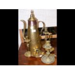 A Middle Eastern style coffee pot, candlesticks, e