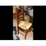 The matching set of eight ladder back dining chair