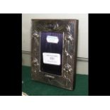 A silver photo frame - 13cm x 10cm