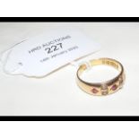 A ruby and seed pearl ring in 15ct gold setting
