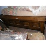 An antique panelled coffer - 170cm long
