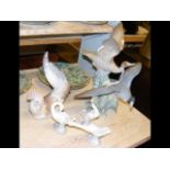 A Lladro figure of geese in flight, together with
