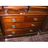 An antique chest of drawers