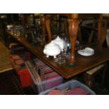 A large oak refectory table on carved bulbous supp