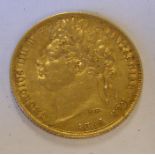 A rare 1823 George IV sovereign with laurel leaf h