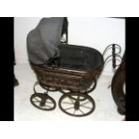 A reproduction doll's pram