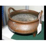 A 16.5cm diameter two handled bronze censer -