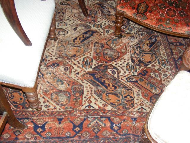 A Middle Eastern rug with geometric border