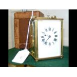 A brass cased repeater carriage clock - 11cm high